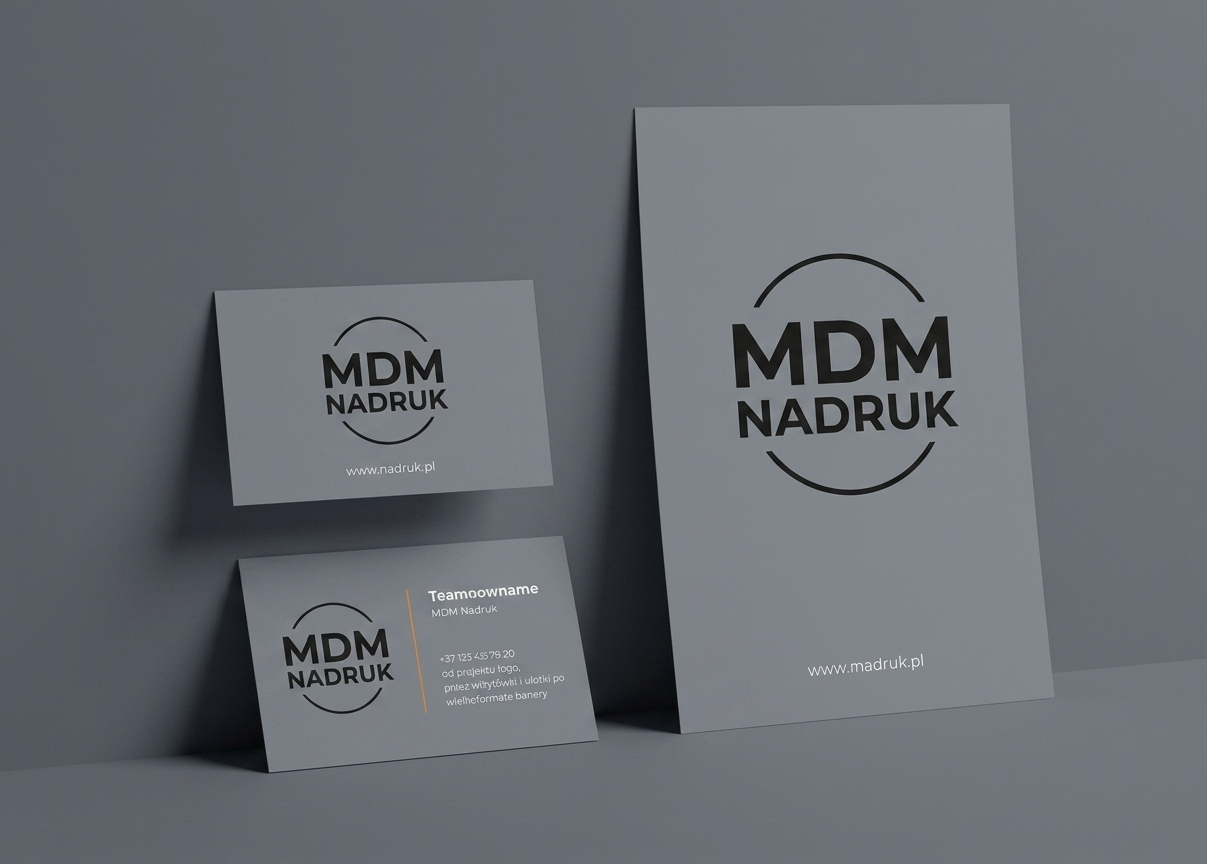 Wizualizacja identyfikacji wizualnej: projekty wizytówek i materiałów reklamowych z logo MDM Nadruk